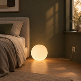 Luna Sphere Floor Lamp — bedroom in early evening, lamp on