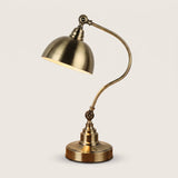 Antique Brass Gooseneck Desk Lamp - antique brass swing-arm lamp with dome shade on a white background