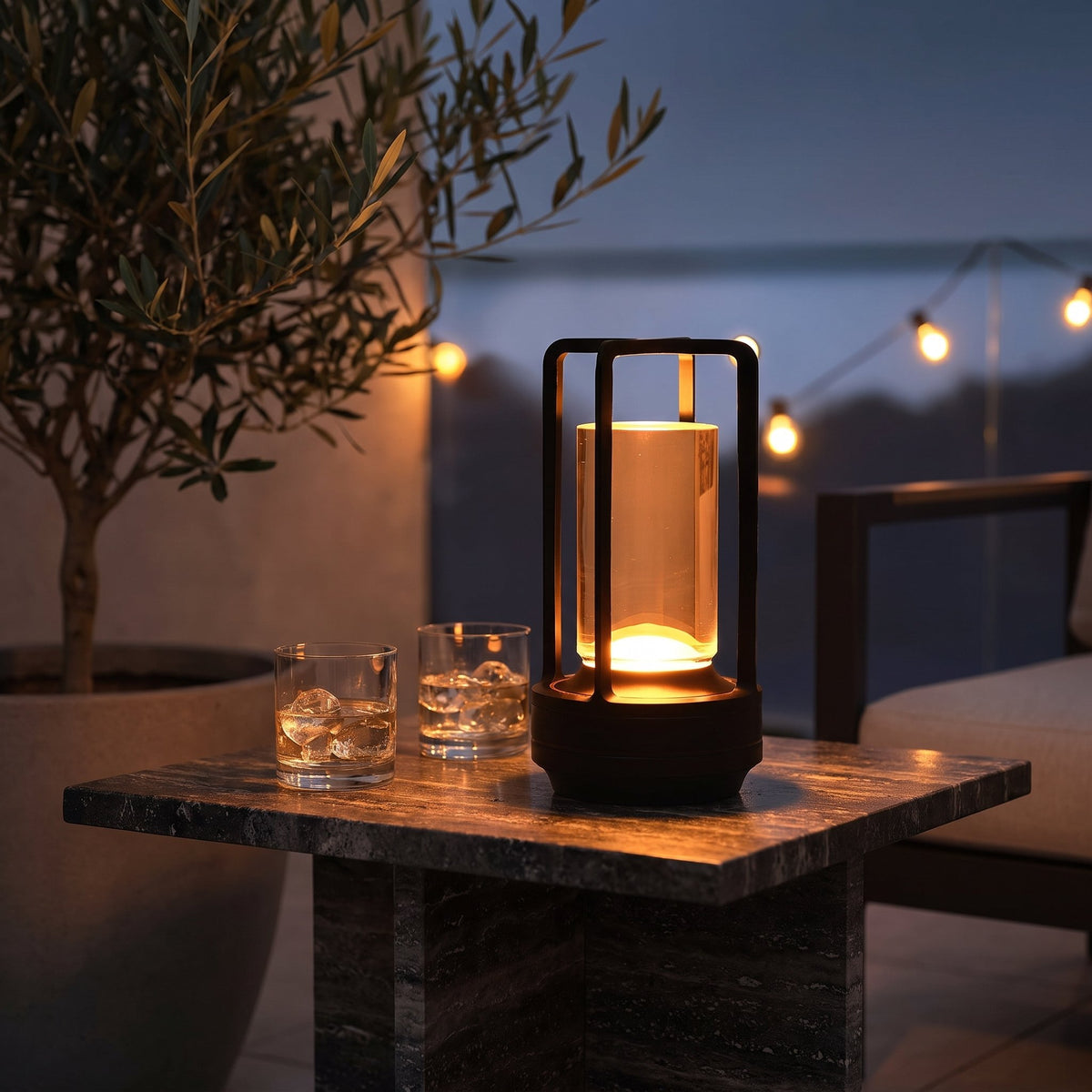 Ridge Portable Lantern — patio lifestyle