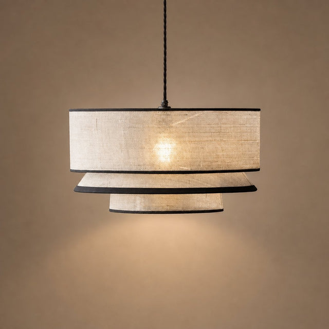 Sable tiered fabric pendant light with three beige tiers and black trim