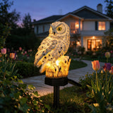 Sentry Owl Solar Light - lifestyle image garden pathway at dusk