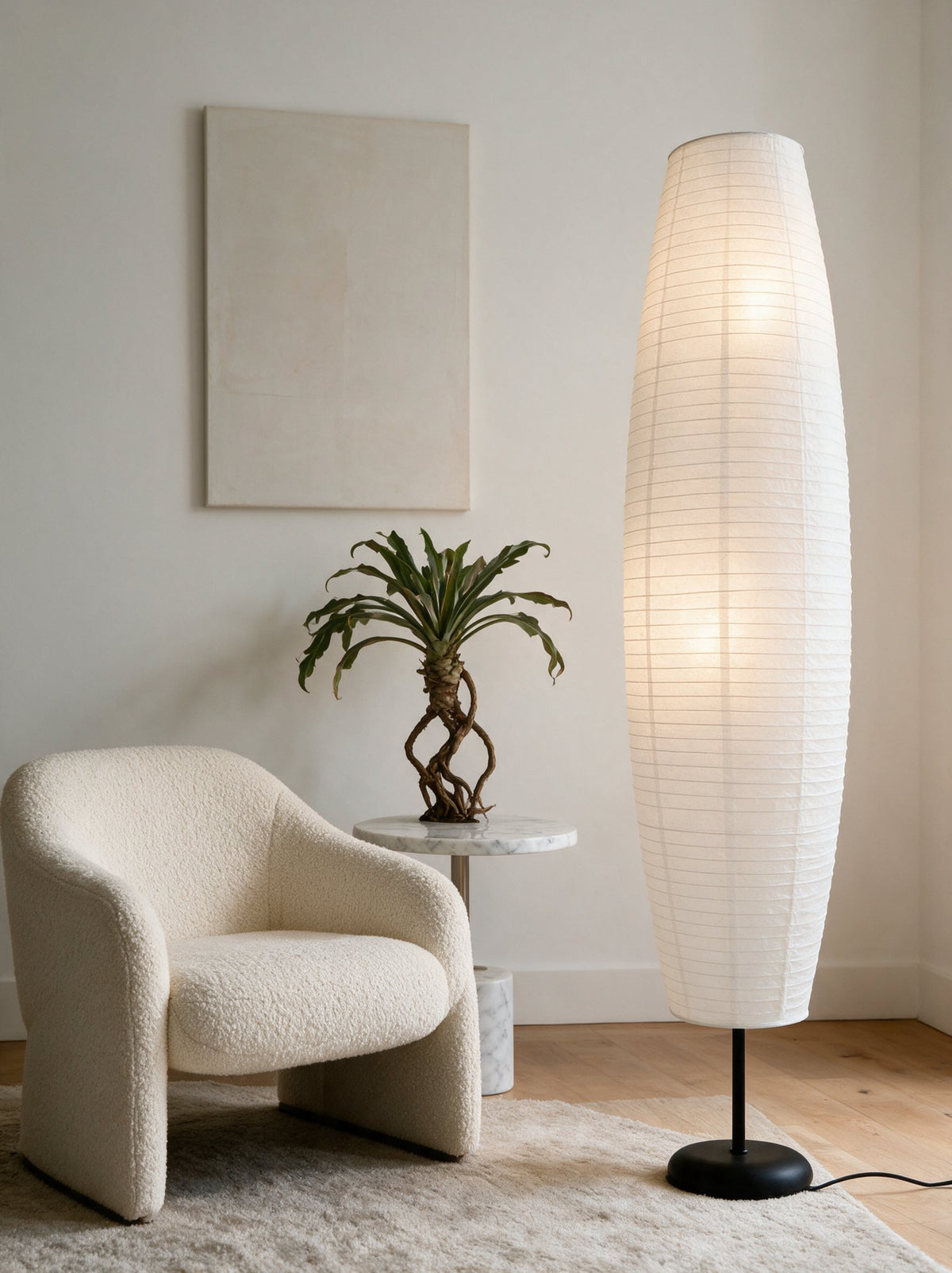 Sora Rice Paper Floor Lamp — armchair lifestyle