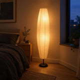 Sora Rice Paper Floor Lamp — bedroom at dusk, lamp on