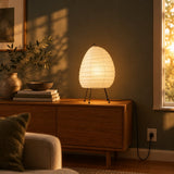 Washi Tripod Table Lamp — living room at golden hour, lamp on